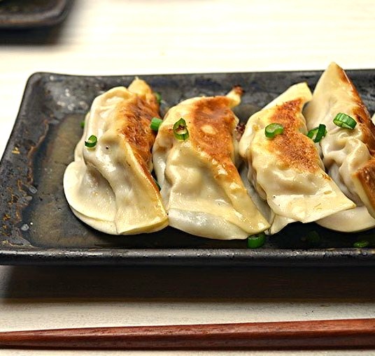 Pork Potstickers with Spicy Dipping Sauce